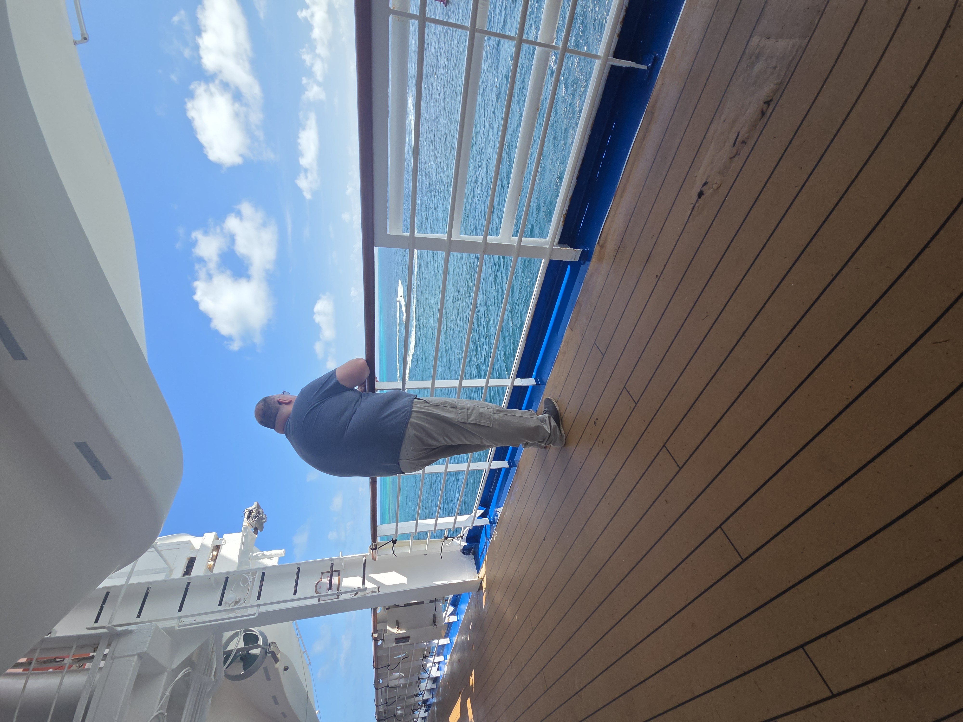 Beautiful view looking over a balcony at scenic coastal waters